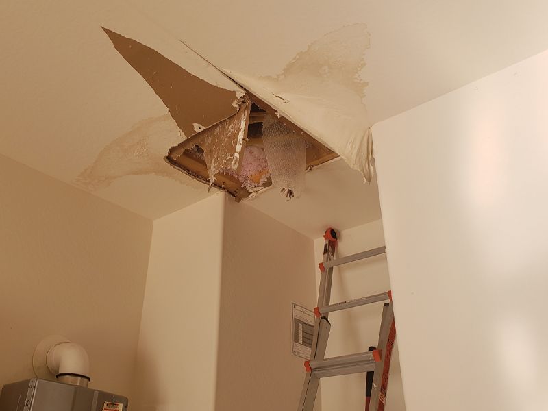 Failed pipe burst in ceiling